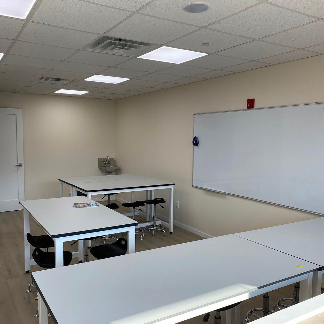 Science teaching space with bench tables and stools