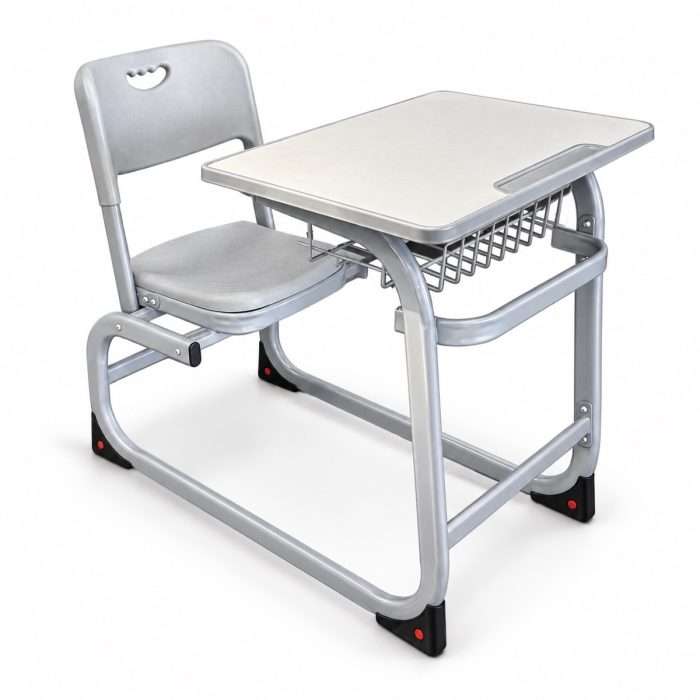 Grey student desk and chair with a wire basket and shaped tabletop